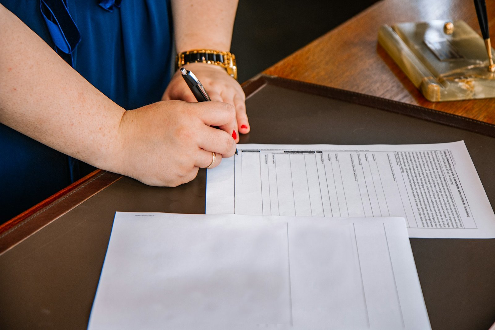Signing documents for a property purchase